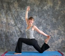Woman Doing Yoga Posture King Arthurs Pose Royalty Free Stock Photos