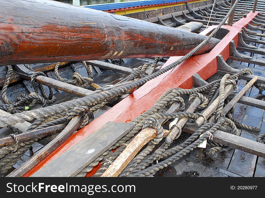 Details of a replica of a viking ship which has been rebuilt after original ships found in the seas around Scandinavia