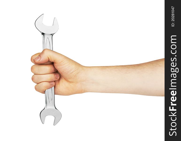 Metal spanner in hand isolated on white background