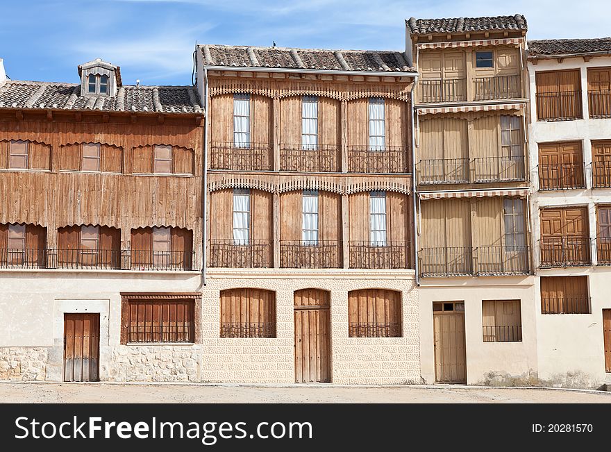 Old houses with wooden balconies around a bullring in PeÃ±afiel, Spain. Old houses with wooden balconies around a bullring in PeÃ±afiel, Spain