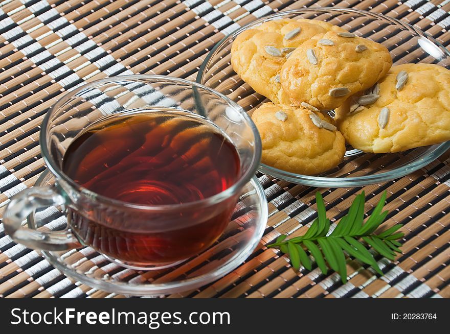 A cup of refreshing tea and delicious snacks. A cup of refreshing tea and delicious snacks