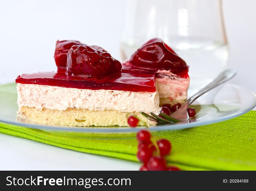 Fruit cake with strawberry and red currant