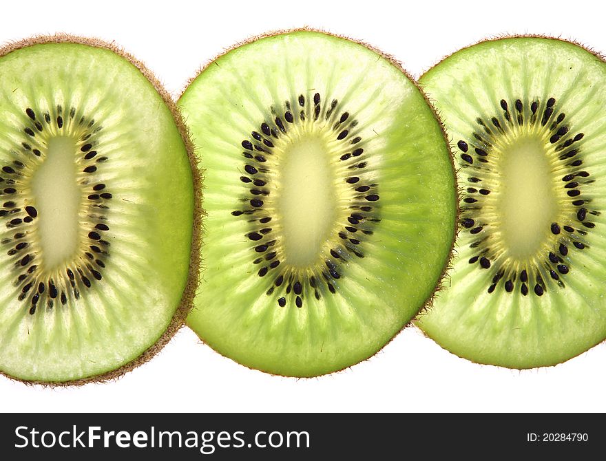 Kiwi fruit slices on whit background