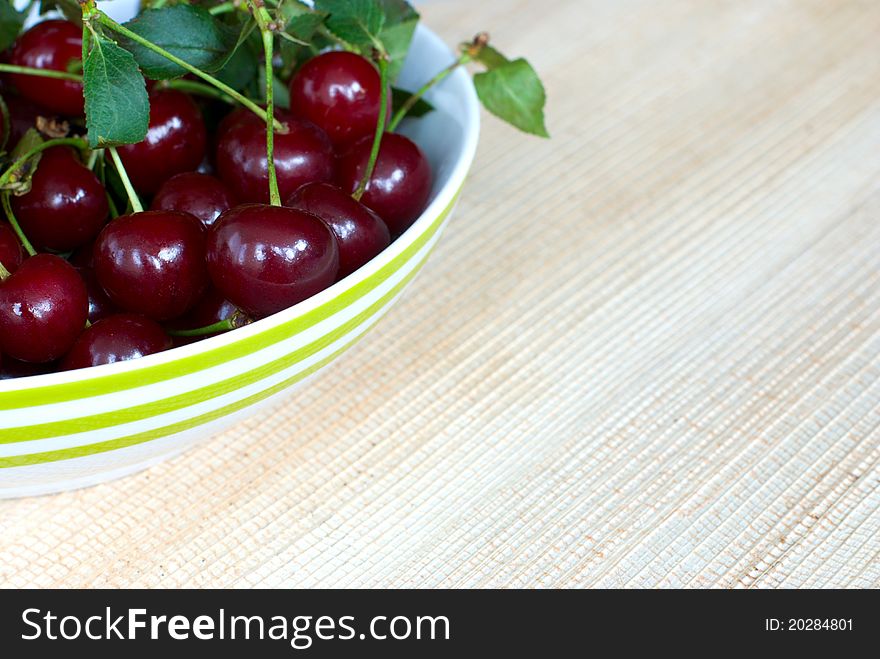 Lot of ripe cherries on a plate. Lot of ripe cherries on a plate