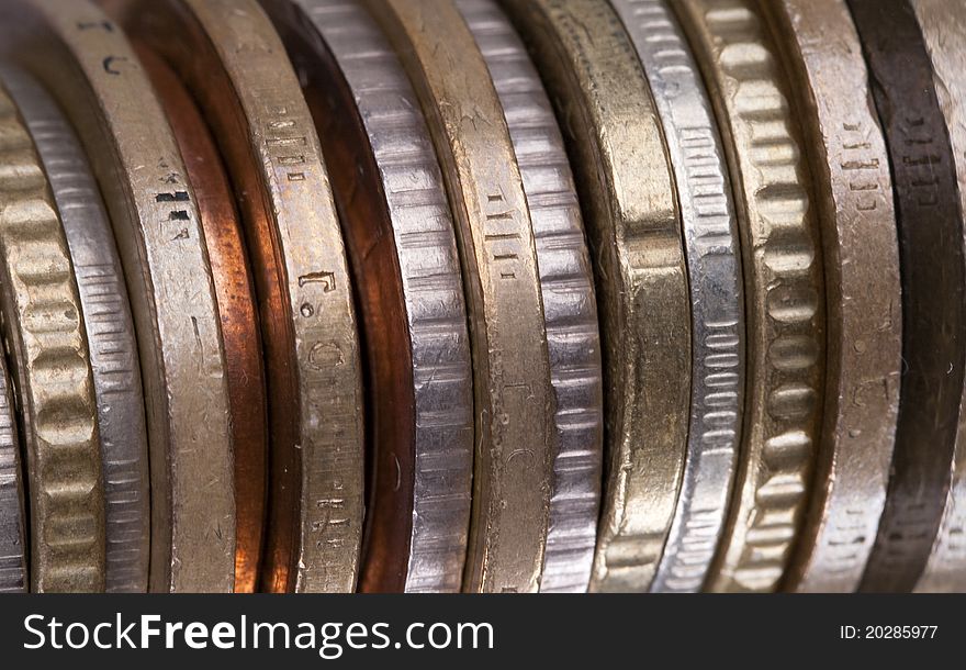 Stack of metal coins of the different countries. Stack of metal coins of the different countries