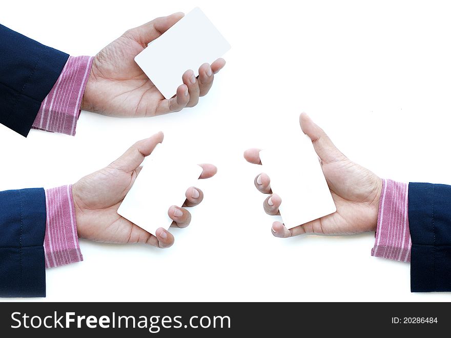 White business card in business man hand isolated on white background. White business card in business man hand isolated on white background