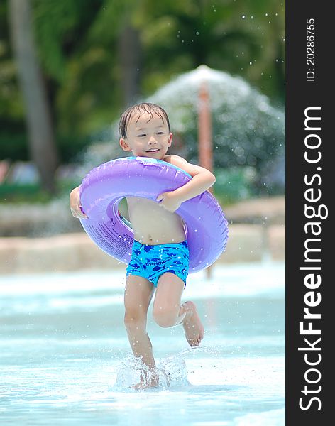 Asian young boy activity on the beach