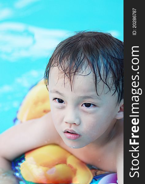 Asian young boy activity on the beach