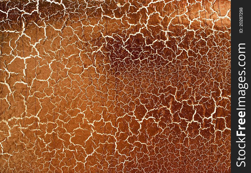 Craquelures brown surface texture closeup background. Craquelures brown surface texture closeup background.