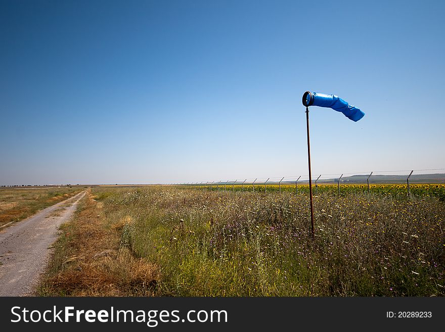 Wind sleeve near road to airport