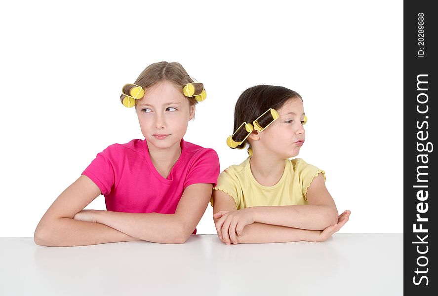 Portrait of young girls with hair curlers. Portrait of young girls with hair curlers