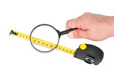 Measuring Tool A Roulette And Magnifier In Hand Stock Photo Measuring Tool A Roulette And Magnifier In Hand Stock Photo