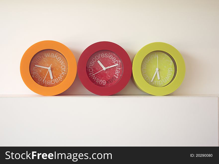 orange red and green clock. orange red and green clock