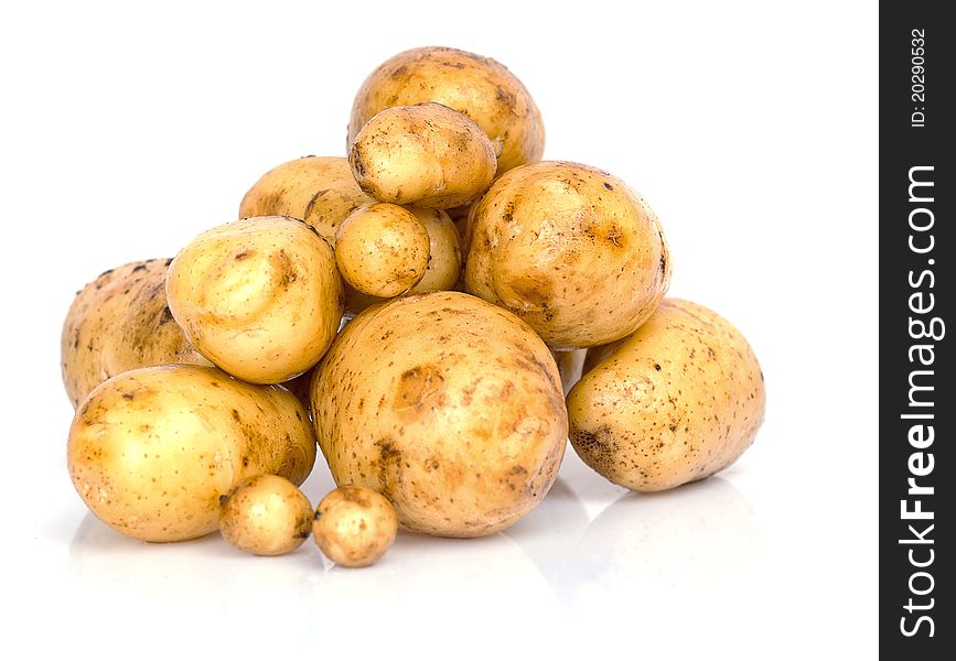 Fresh Potatoes On A White