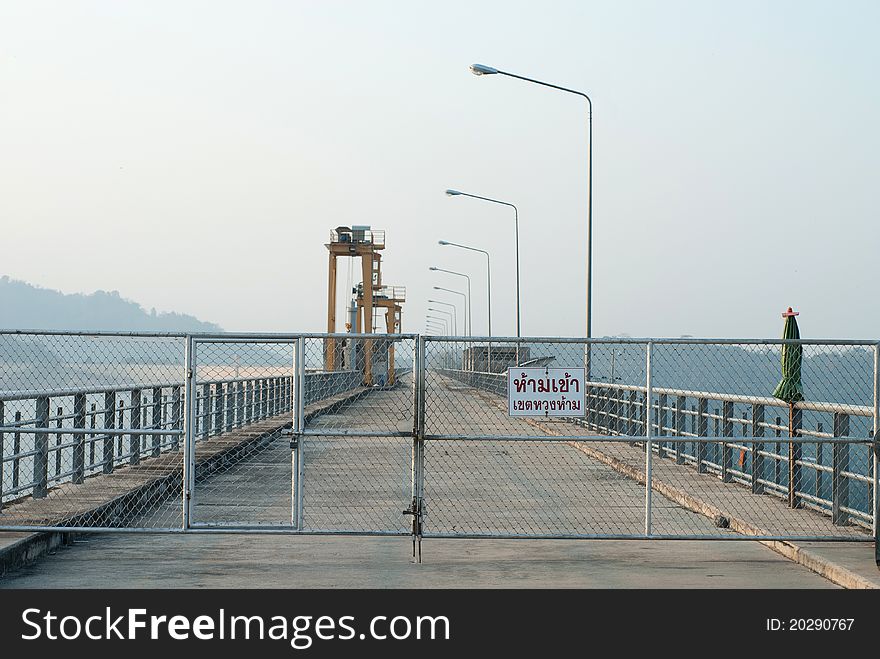 Sunrise at Khun Dan Prakarnchon Dam in Thailand