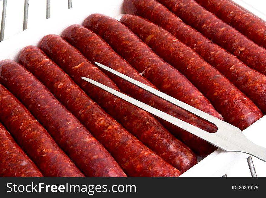 To illustrate the raw sausages grilled summer. To illustrate the raw sausages grilled summer