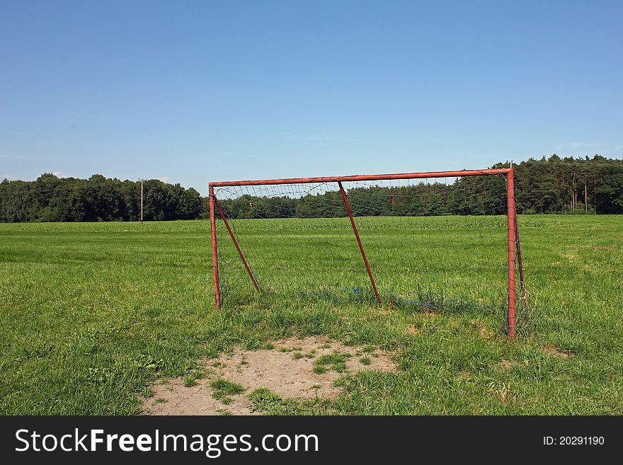 A football goal placed on a meadow for the kids to play