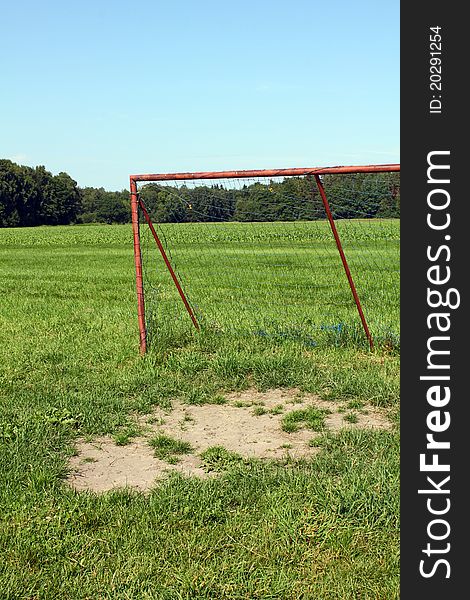 A football goal placed on a meadow for the kids to play