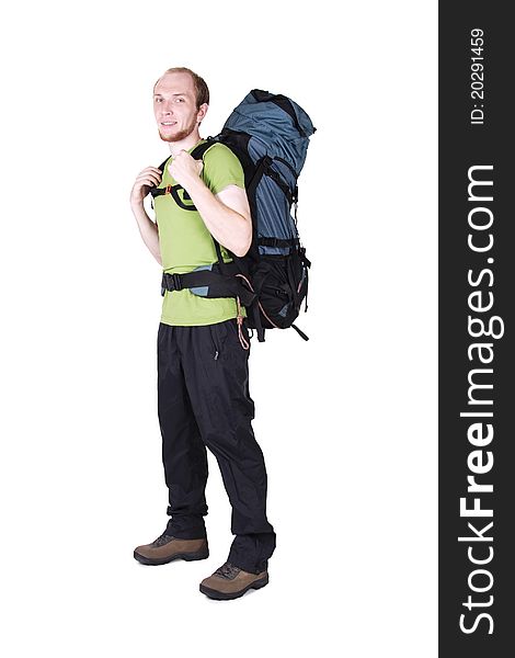 Tourist with big backpack standing isolated