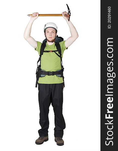 Mountain tourist in helmet and with big backpack standing and holding pick, isolated. Mountain tourist in helmet and with big backpack standing and holding pick, isolated