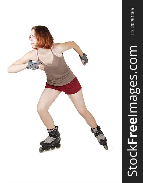 Young beauty girl on rollerblades in start pose isolated