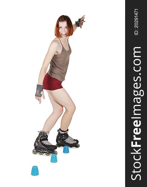 Young beauty girl on rollerblades, artistic slalom,  isolated