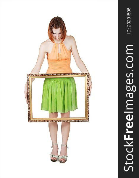 Young girl in bright clothes holding decorative picture frame, isolated. Young girl in bright clothes holding decorative picture frame, isolated