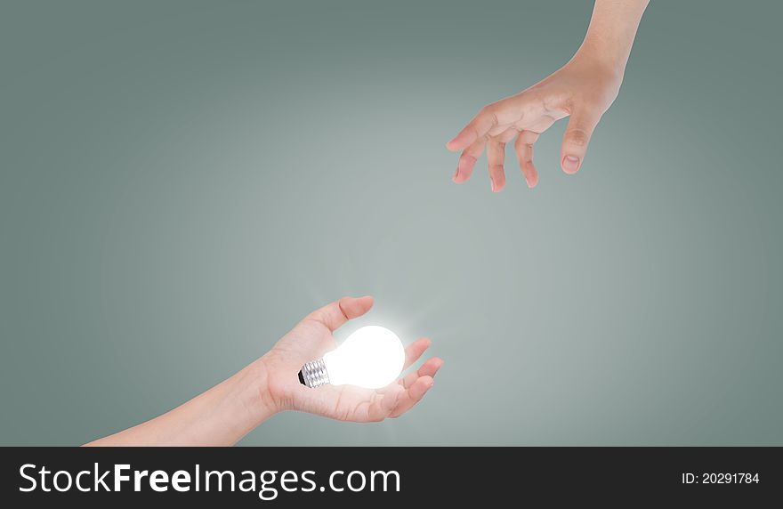 Women hand with light bulb. Women hand with light bulb.