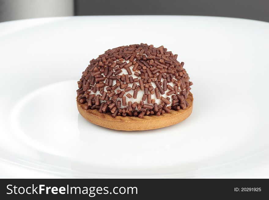 Chocolate cake on plate round