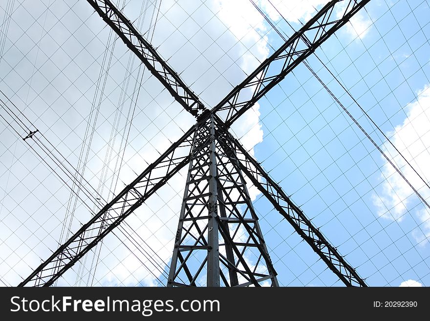 It is a very unique type of power tower with cables. It looks like a robot with cover over your head. It is a very unique type of power tower with cables. It looks like a robot with cover over your head.