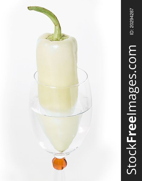 Vegetable in wine glass with water. Vegetable in wine glass with water.
