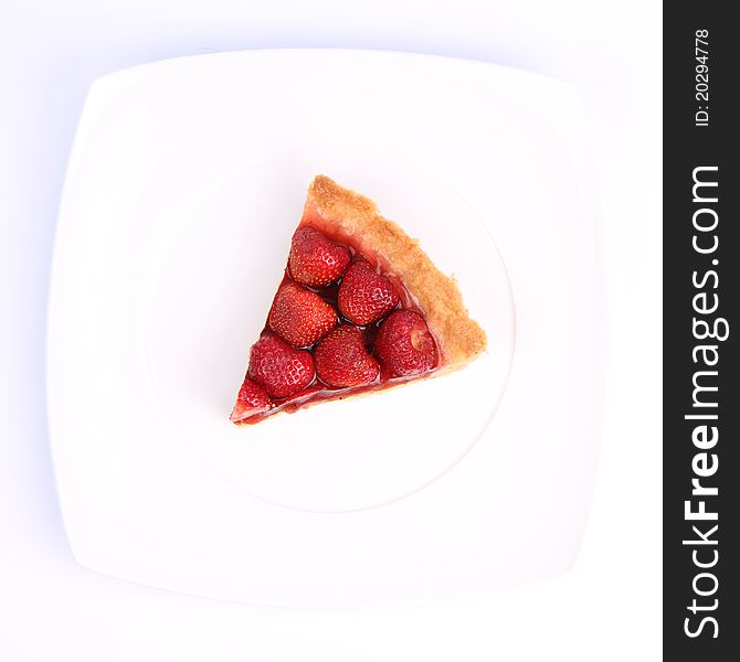 Strawberry Tart portion on a white background