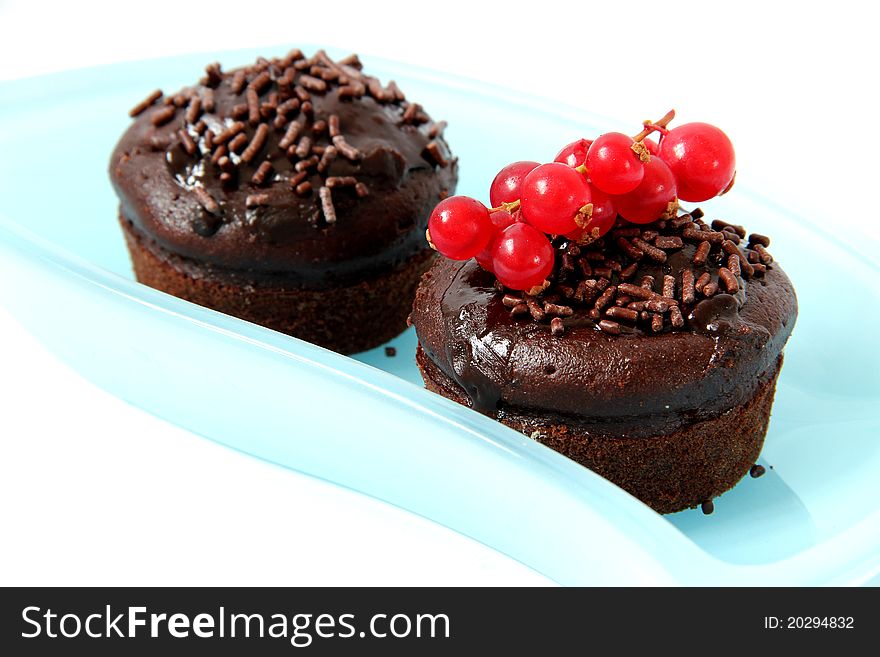 Chocolate cupcake on white background