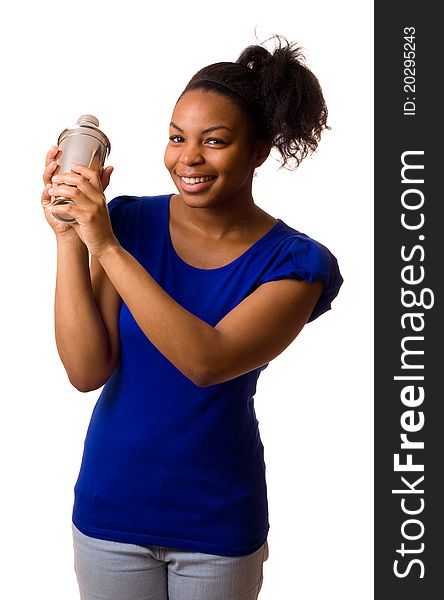 A young woman shaking drinks isolated on a white background. A young woman shaking drinks isolated on a white background.