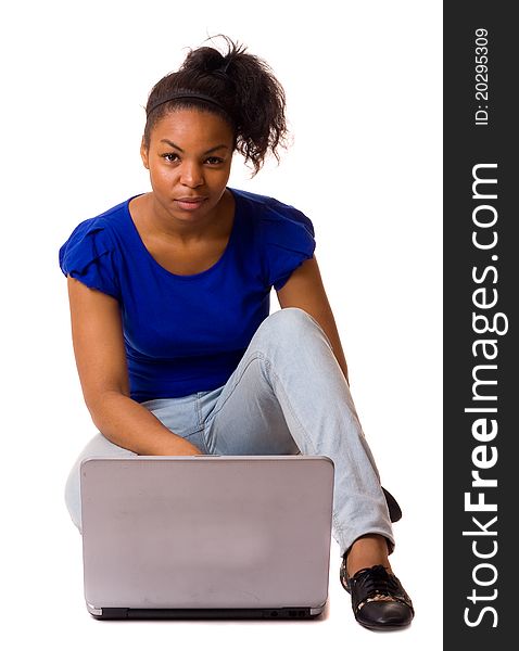 A young woman with a laptop computer. A young woman with a laptop computer.
