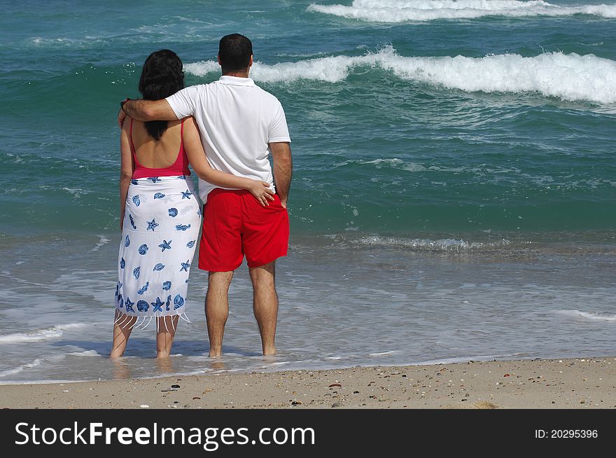 Portrait of a lovely romantic couple on the beach