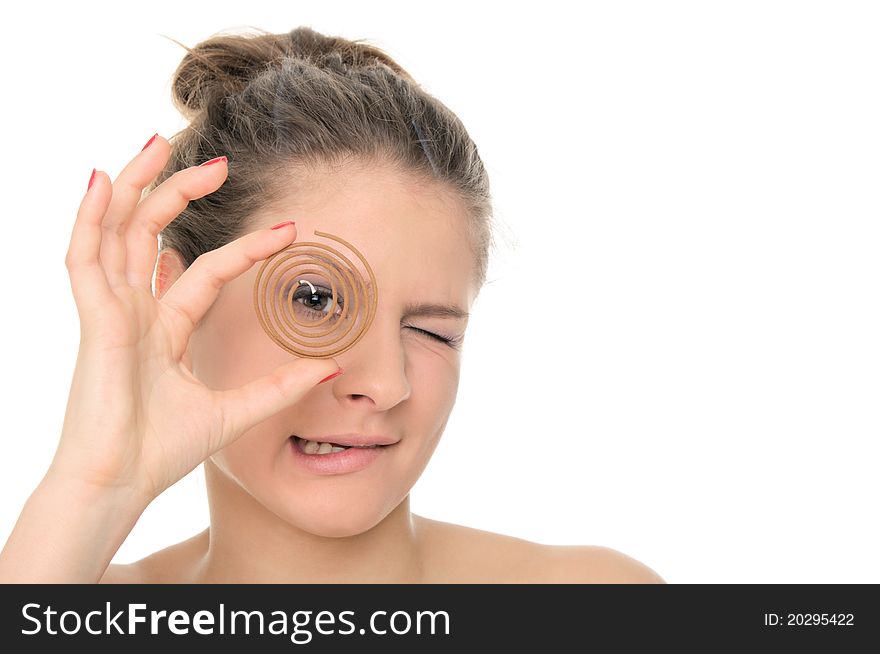 Young woman holds spiral aromas  isolated in white