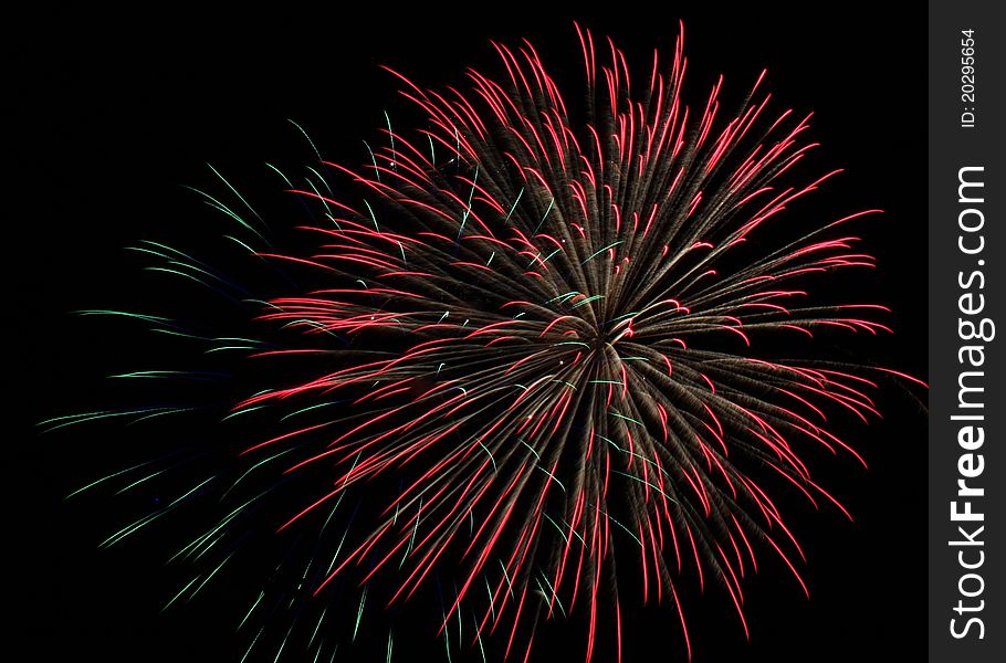 Long exposure of fireworks in the nighttime sky