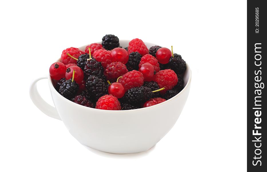 Fresh berries in bowl over white. Fresh berries in bowl over white