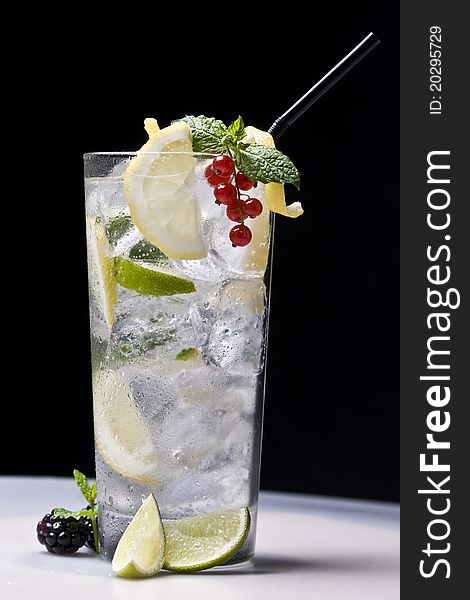 Refreshment cocktail with lemon and lime