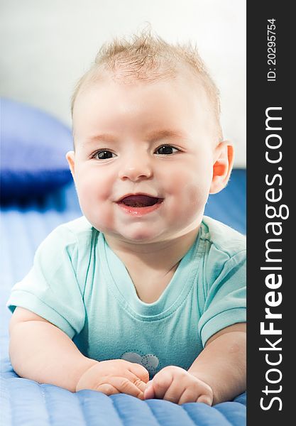 Closeup portrait of adorable smiling baby boy. Closeup portrait of adorable smiling baby boy