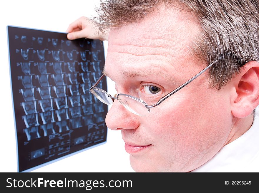 Doctor viewing MRI scans with isolated background