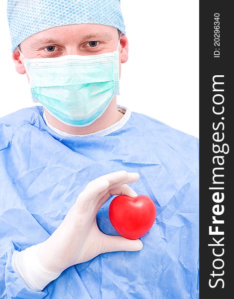 Young doctor with heart in his hand