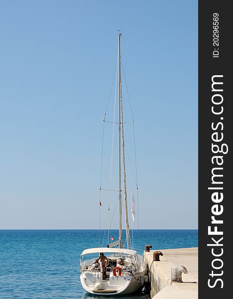 Sail boat with skyline in the background and copy space. Sail boat with skyline in the background and copy space