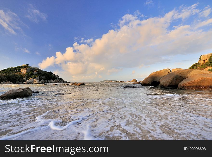 Sea coast in sunrise lighting