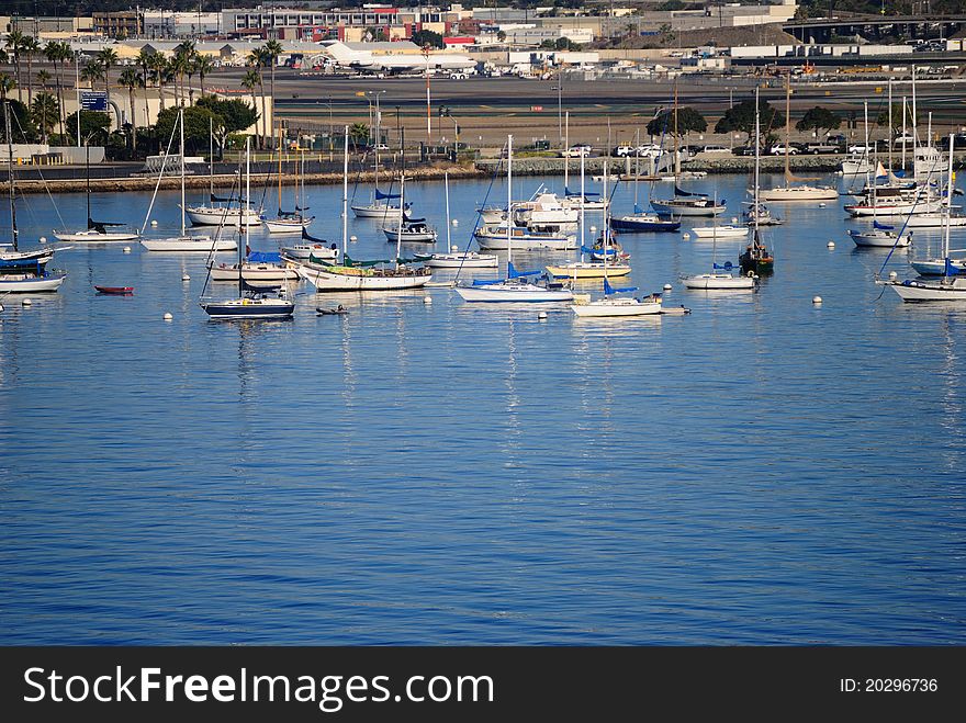 Boats in San Diego California Harbor on a calm clear day. Boats in San Diego California Harbor on a calm clear day.