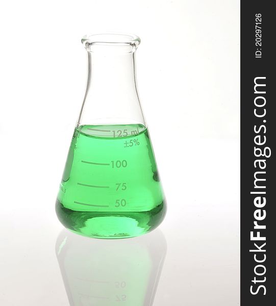 Beaker with green compound substance. Beaker with green compound substance