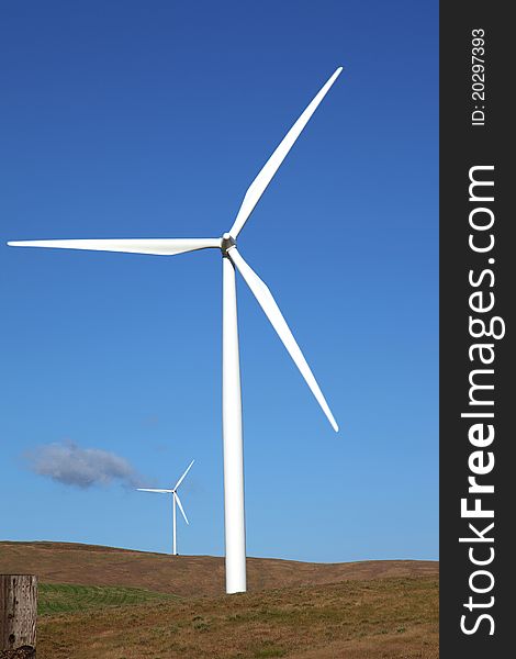 Wind turbines in a rural landscape in Washington state. Wind turbines in a rural landscape in Washington state.