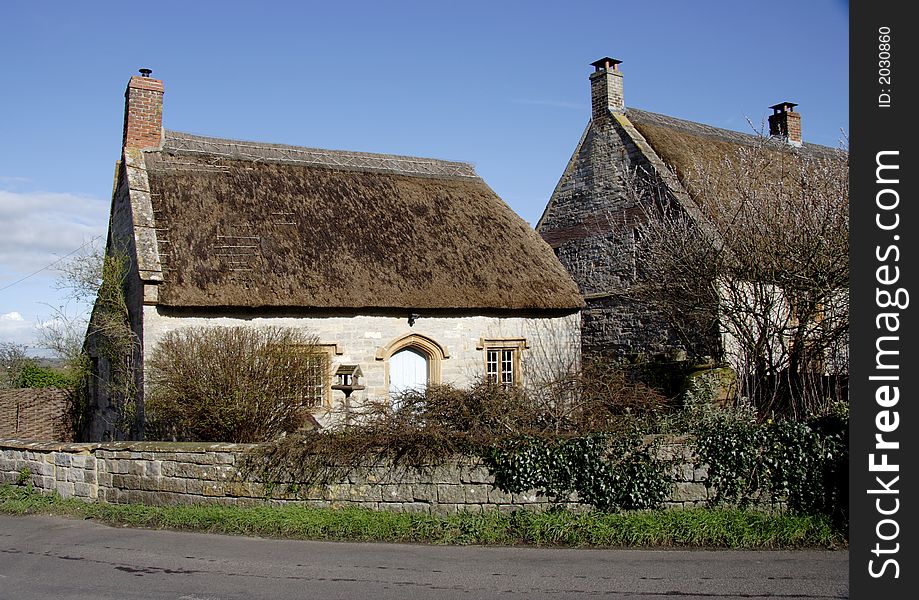 Thatched natural stone Medieval House in Rural England. Thatched natural stone Medieval House in Rural England