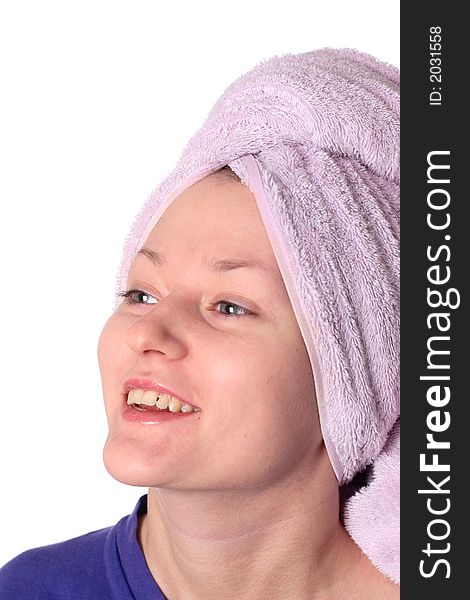 Young girl with towel on head. Smiling. Young girl with towel on head. Smiling.